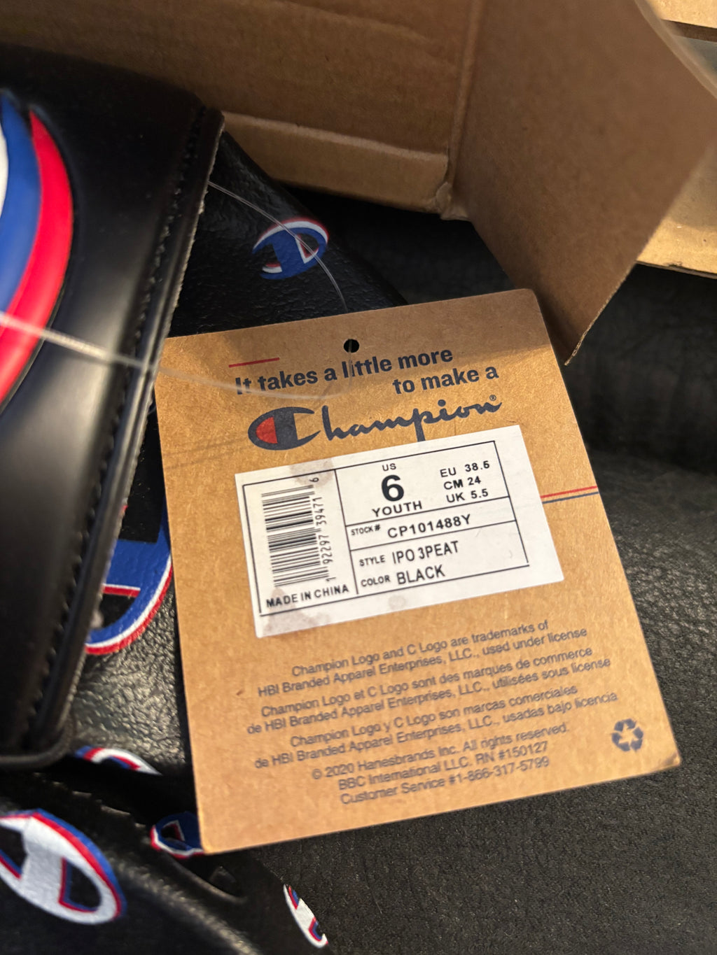 Champion Black IPO 3PEAT Youth Slide Sandals with Red & Blue Logo Accents